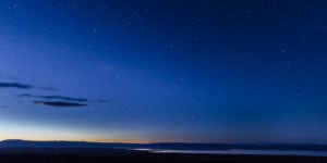 Predawn colors fill the skies above Oregon's high desert in a blue panorama.