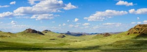 Green hills of the Owyhee Prairie in Oregon's high desert provide expansive vistas.