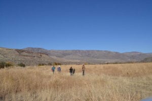 Volunteers hike back to Denny Jones Ranch