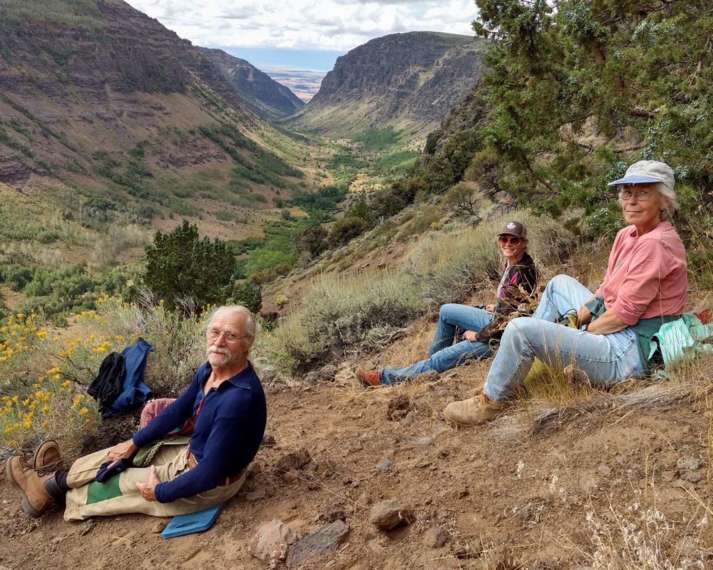 John, Jenny (right), and another volunteer take a break from trail stewardship in Steens Mountain Wilderness.